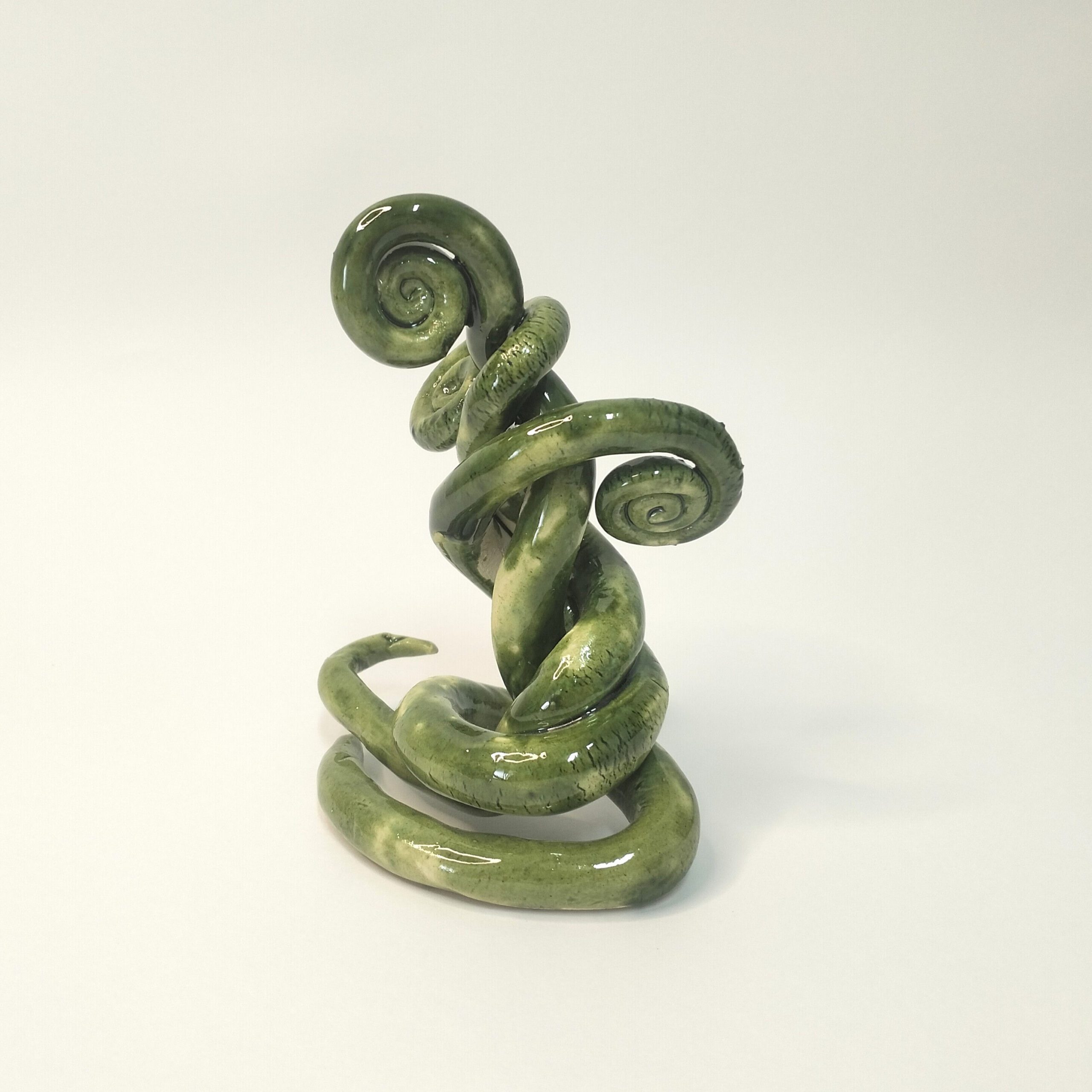 Escultura torcida verde