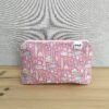 Bolsa necessaire rosa em tecido de algodão com fecho e padrão de jardinagem.